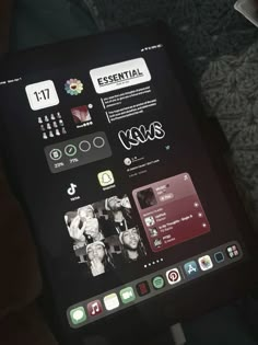 an ipad with some stickers on it