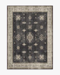 an area rug with many different designs on it