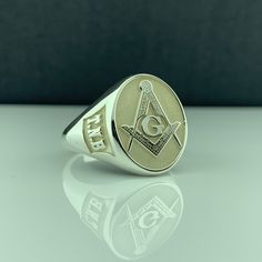 Masonic Rings, Silver Masonic Rings, Master Mason Rings, Gold Masonic Rings, Mens Masonic Rings, Masonic Wax Seal Ring, Ring, Freemason Ring This product is GUARANTEED for life. - College graduation rings for men and women delicately engraved with your school logo or any other initials or image you want. - The ring has solid back. Deep and detailed engraving very delicately handcrafted unisex - looks super cool on both women & men - The ring is 925 Silver - Please contact me for your 14 carat an Symbolic Engraved Adjustable Oval Ring, Symbolic Adjustable Oval Engraved Ring, Symbolic Oval Engraved Adjustable Ring, Adjustable Symbolic Rings With Polished Finish, Classic Nickel Free Round Rings, Nickel Free Classic Round Rings, Adjustable White Symbolic Rings, Symbolic Oval Rings With Polished Finish, Graduation Rings College