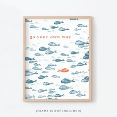 an orange fish floating in the ocean surrounded by blue and white watercolors with words go your own way