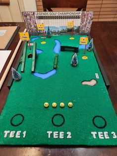 a miniature golf course is displayed on a table