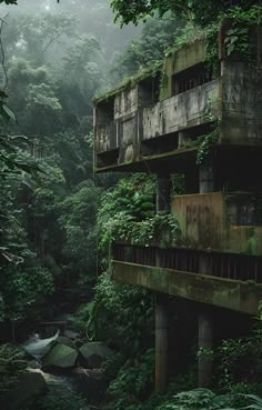 an abandoned building in the middle of a jungle with lots of trees and plants growing on it