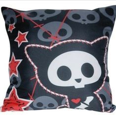 a pillow with skulls and stars on it