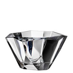 a clear glass vase sitting on top of a table