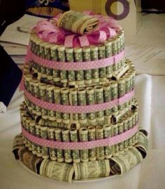 a stack of money sitting on top of a table