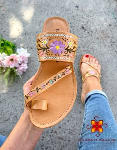 The best look for a woman is charisma combined with nice shoes. Look amazing with these beautiful Mexican Huaraches. Beaded sandals Fashion and comfortable. Mexican beaded sandals, Leather Mexican Sandals, Mexican Shoes for women with colorful beaded, huaraches in all sizes *The color may vary slightly as sandals are handmade and every piece is unique. *Sandals are printed in México standard size number but published sizes are US SIZES. *Genuine leather, vegetable-based dyes, and recycled rubber soles. The genuine leather huaraches will stretch and mold to your feet. Becoming softer every time you wear them and will provide durability and comfort. *Select your size, if you use 7.5 order a 7. If you are a 7 order a 7. The leather will mold by use, they stretch. If your feet are wide and thi Unique Sandals, Mexican Huaraches, Mexican Shoes, Mexican Sandals, Mexican Fashion, Huarache Sandals, Beaded Sandals, Girly Shoes, Aesthetic Shoes