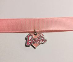 Pink ribbon choker with selection of Barbie-related charms available. Please contact me with any custom requests. Ribbon Choker, Roller Skate, Choker Necklaces, Pink Ribbon, Favorite Jewelry, Necklace Etsy, Choker, Choker Necklace, Bathing Beauties