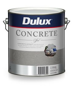 a white paint can with the words dulux concrete in blue and red on it