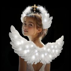 PRICES MAY VARY. Premium Feathers: These angel wings and halo headband are crafted from soft, white feathers for a comfortable feel. Fully handcrafted with a sturdy structure, they resist fading and deformation. The plump, lightweight feathers won't fall off, ensuring you achieve the best angelic or mother of Mary look. Three Lighting Modes: Our angel costumes for girls feature three lighting modes: fast flash, slow flash, and steady on. Choose the mode that best fits your needs to look cute, li Girls Angel Costume, Angel Halo Headband, Cupid Wings, Feather Fairy, Angel Costumes, Angel Wings And Halo, Angel Wings Halo, Wings And Halo, Angel Halo