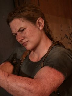 the last of us character with arm around head