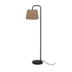 a black floor lamp with a beige shade on the base and a light bulb in the middle