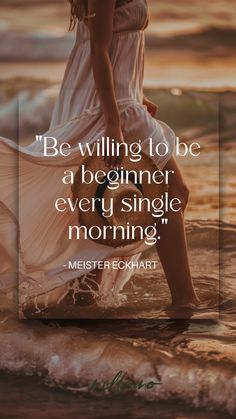 a woman standing in the water with a quote about being a beginner every single morning