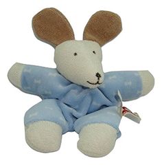 a small stuffed animal is wearing a blue outfit and has brown ears on it's head