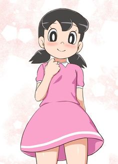 a girl in a pink dress is standing with her hand on her chin and looking at the camera