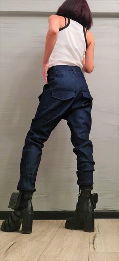 "Extravagant Denim Pants, Harem Casual Pants, Urban Pants, Loose Pants, Punk Pants, Gothic Pants, Outer pockets, New collection ❤️ Extravagant designs and high quality fabrics! ❤️ Materials & Care Denim Hand wash at low temperatures. Do not machine dry. Do not iron. Do not dry clean! ❤️ Sizing We can make your piece from XS to 5XL! Everything in the shop can be also made according to your measures free of charge! ❤️ Shipping ✈ Ready to ship The time I need to prepare an order for shipping va Gothic Pants, Punk Pants, Blouson Dress, Pants Loose, Loose Shirts, Womens Pants, Pantalon Large, Loose Pants, Asymmetrical Design