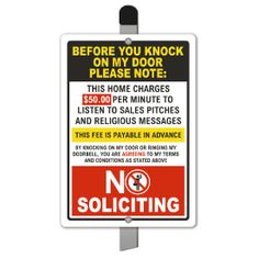 a no solicing sign on a pole with the words before you knock on my door please note