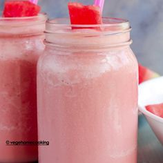 two mason jars filled with watermelon drink