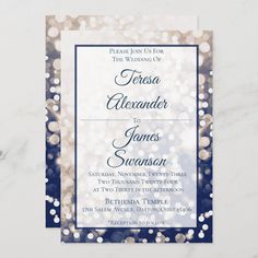 a blue and white wedding card with glitter