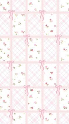 a pink and white checkered background with roses