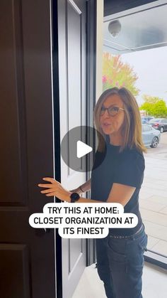 a woman standing in front of a door with the caption try this at home closet organization at its finest