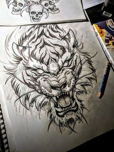 a drawing of a tiger's head with two skulls on the side and one behind it