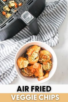 an air fried veggie chips recipe in a bowl with the title above it