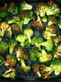 broccoli florets are in a black container