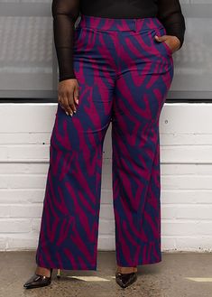 Style # 4029BZAThe Thema wide leg African-print pants are an absolute #DiyanuTribe must! The bold print is paired with just the right amount of stretch for work or play and features a wide leg that's flattering on all. Pair it with one of our slinky bodysuits for an instant wow-factor. Description Zip and clasp closure Front pockets﻿ Tailored styleInseam: 33" 72% rayon, 24% nylon, 4% spandex Designed in the USA, imported Business Attire Ideas, Zebra Abstract, African Print Pants, Pleated Dresses, Wrap Skort, Classy Couple, Teacher Clothes, African Inspired Fashion, Ankara Style