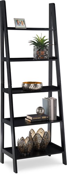 a ladder shelf with books and other items on it, against a white background that is also used as a bookcase