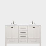 the double sink vanity is white and has two faucets on each one side