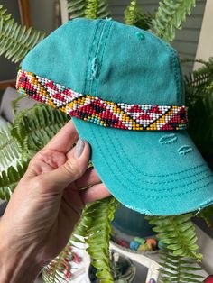 Women's distressed high ponytail, hand beaded ball cap. Casual Beaded Hats For Festivals, Beaded Cap Hats For Festivals, Casual Beaded Cap Hat, Casual Beaded Cap, Bohemian Adjustable Baseball Cap For Festivals, Adjustable Bohemian Visor Hat, Beaded Ball, Rancher Hat, Beaded Hat