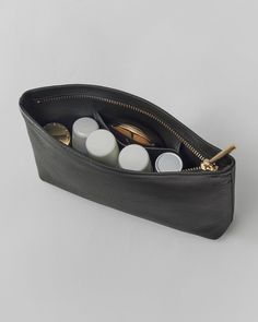 A petite partner for your everyday bag. Our Mini Leather Pouch is crafted from luxurious Italian pebbled leather with a compact yet roomy interior for your makeup and other smaller essentials. Mini Zipper Pouch, Small Zipper Pouch, Leather Makeup Bag, Satchel Backpack, Travel Jewelry Case, Leather Wear, Backpack Travel Bag, Wallet Organization, Zippered Tote