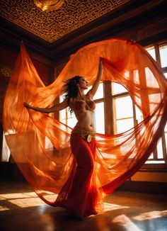 a woman in an orange belly dance costume