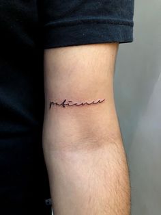 a person with a tattoo on their arm that says, merrime in cursive writing