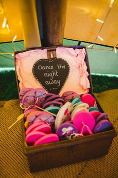 an open suitcase filled with lots of different types of yarn and crochet hooks