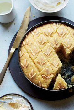 a cake in a pan with slices cut out