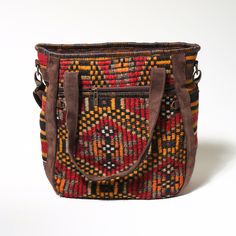 KILIM HANDMADE SHOULDER Bag is a unique handmade product woven on Anatolian carpet and kilim looms. The leather parts are made of genuine leather and the inner parts are made of high quality waterproof fabric. It has two 25x25 cm (9.8x9.8 inches) zippered compartements on both sides and 20x15 (7,9x6 inches) zippered compartment inside. Can be used as handbag and shoulder bag. Its large interior volume has the capacity to meet your daily needs. This bag is a part of a carpet which weaved in somew Brown Woven Bags For Daily Use, Square Woven Bag For Everyday Use, Brown Weaving Shoulder Bag For Daily Use, Square Woven Bags For Everyday Use, Traditional Brown Hobo Bag For Everyday Use, Brown Weaving Bags For Everyday Use, Brown Weaving Bags For Daily Use, Brown Woven Bags For Everyday Use, Handmade Multicolor Hobo Bag For Everyday