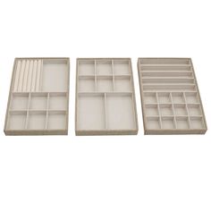 three empty trays with dividers on each side