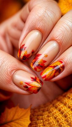 Get inspired by this stunning autumn-themed nail design! Featuring rich, bold colors and intricate leaf-inspired art, these nails perfectly capture the essence of fall. Set against a warm golden backdrop, this cozy and vibrant look is perfect for embracing the beauty of the season. Save this pin for your next fall nail idea! Fall Watercolor Nail Art, Autumn Holiday Nails, Fall Tree Nails, Nude Fall Nail Designs, Fall Nails Leaves, Fall Leaves Nails, Golden Backdrop, Fall Leaves Nail Art, Xmas Nail Designs