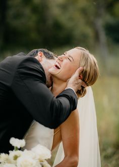 Candid portrait of bride and groom on wedding day Bride And Groom Candid Photos, Wedding Portraits Bridal Party, Intimate Wedding Poses, Bride And Groom Dip Photo, Relaxed Wedding Photography, Bride And Groom Family Pictures, Groom Portraits Outdoor, Bride And Family Pictures, Backyard Wedding Portraits