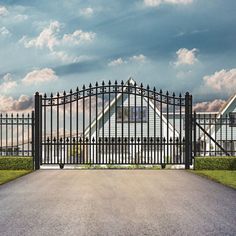 an iron gate in front of a house