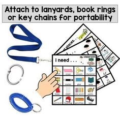 a hand holding a blue lanyard next to some items that include keys and other items