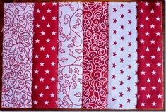 four red and white paper pieces with stars on them, all lined up in rows