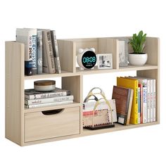 a book shelf with books, purses and other items on it in front of a white background