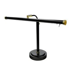 a black and gold desk lamp on a white background