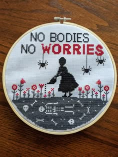 a cross stitch pattern with the words no bodies, no worris on it