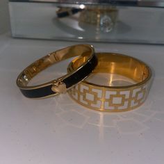 Black And Gold Bangle Bracelet And White And Gold Bangle Bracelet By Kate Spade Two Bracelets In This Bundle! Each Originally 128. Make An Offer! Rims Have Some Moderate Scratches And Tarnishing But They Are Still In Good Condition Kate Spade Bracelet, Gold Bangle Bracelet, Gold Bangle, Spade Jewelry, Kate Spade Jewelry, Gold Bangles, Bangle Bracelet, Black And Gold, Womens Jewelry Bracelets