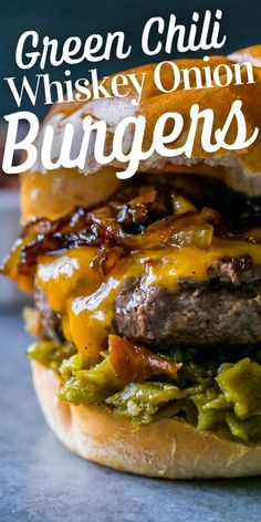 a cheeseburger with bacon and onions on a bun is shown in front of the words, green chili whiskey onion burgers