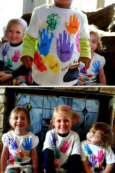 two children with their hands painted in different colors