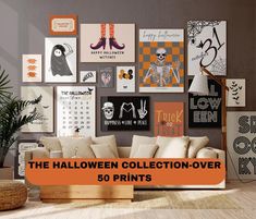 the halloween collection - over 50 prints are on display in this living room with orange accents